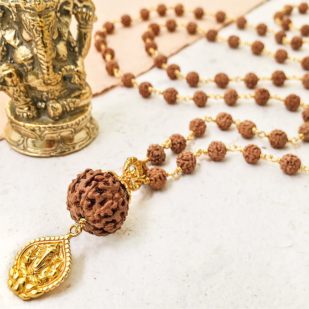 Bali mala bracelet of Sacred Rudraksha and bronze Bali mala bead